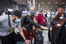 Arrivée en France de réfugiés, via les “couloirs humanitaires".