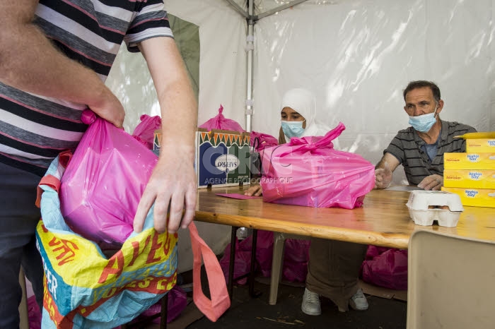 Distribution alimentaire au mois d'août par l'association ASA.