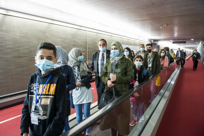 Arrivée en France de réfugiés, via les “couloirs humanitaires".