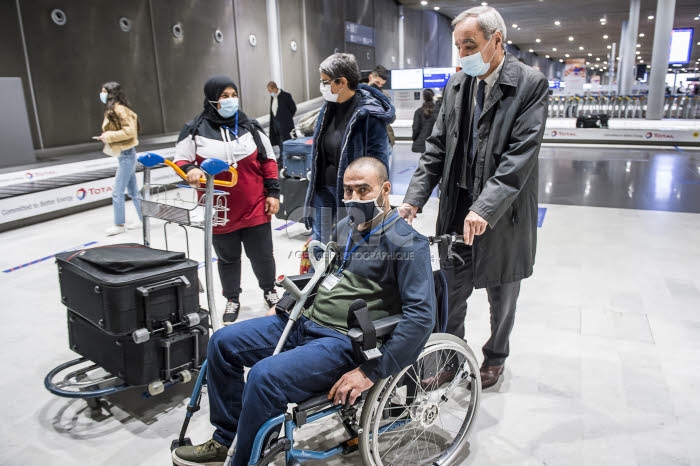 Arrivée en France de réfugiés, via les “couloirs humanitaires".