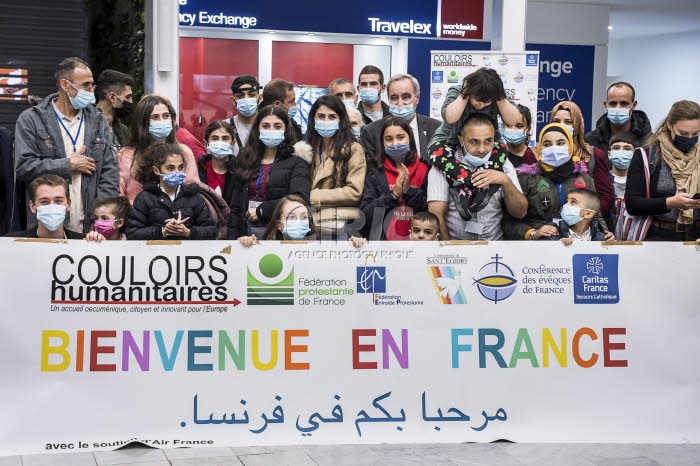 Arrivée en France de réfugiés, via les “couloirs humanitaires".