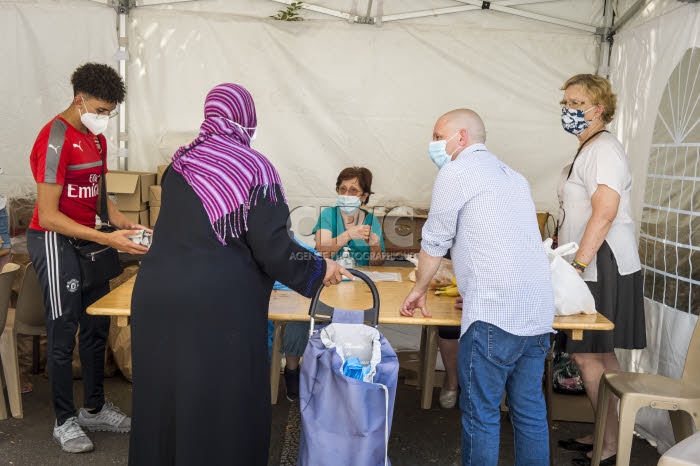 Distribution alimentaire au mois d'août par l'association ASA.