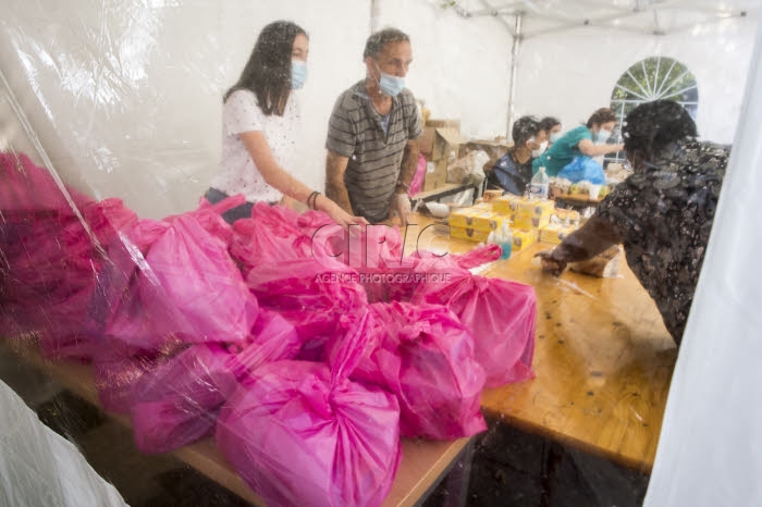 Distribution alimentaire au mois d'août par l'association ASA.