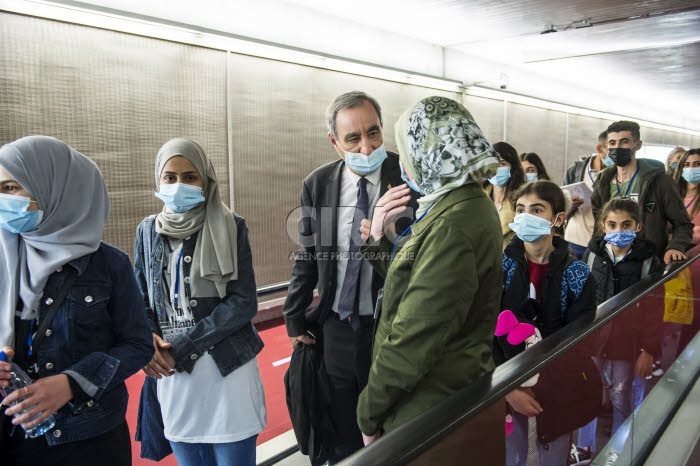 Arrivée en France de réfugiés, via les “couloirs humanitaires".