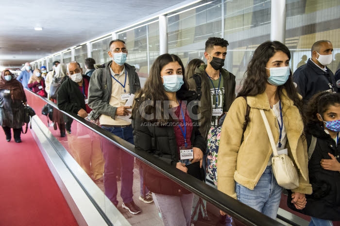Arrivée en France de réfugiés, via les “couloirs humanitaires".